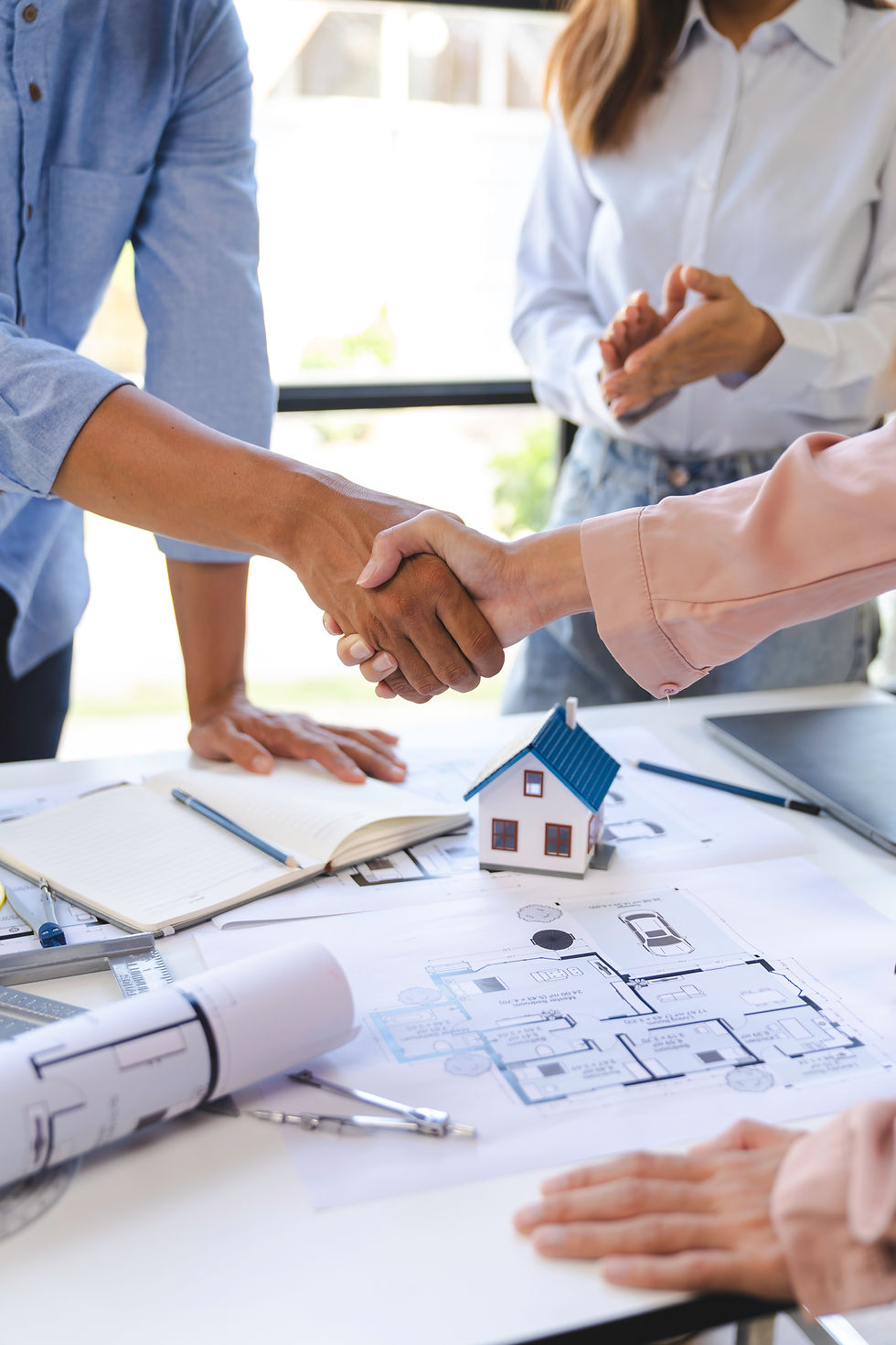 business-people-shaking-hands-over-architectural-p-2026-01-08-02-18-12-utc.jpg