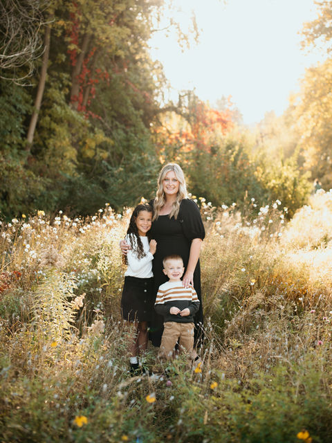 Boise Family Photography clients posed looking at camera during golden hour