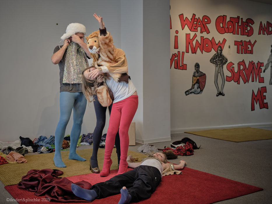 a family in colorful costumes playing.