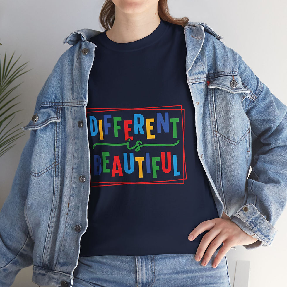 Thumbnail: Person in denim jacket wearing navy 'DIFFERENT IS BEAUTIFUL' colorful t-shirt.
