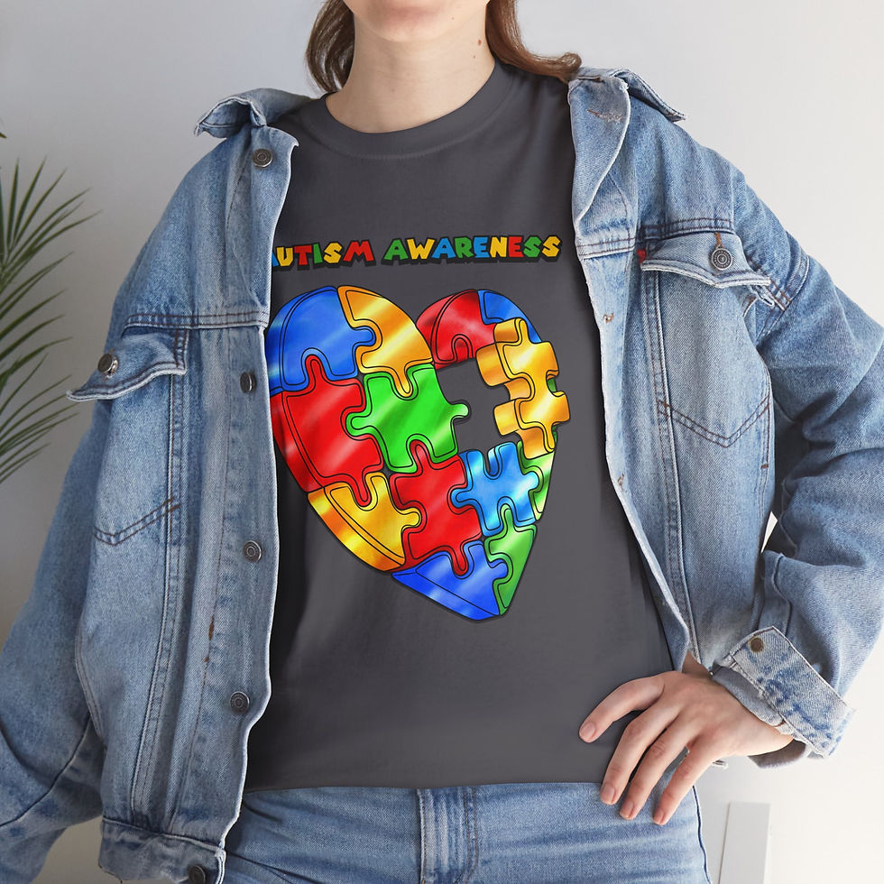 Thumbnail: AUTISM AWARENESS tee featuring colorful puzzle piece heart design.