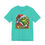 Thumbnail: Turquoise t-shirt featuring Grinch in Santa suit, "Merry Grinchmas" text, decorations.