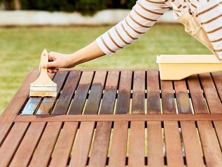 Painting stain on a teak table