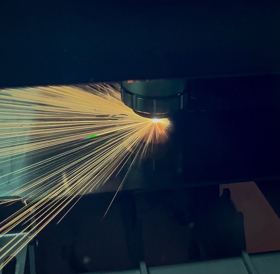 Fibre laser cutting precision metal components.