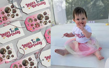 "A special occasion like this called for a custom logo! I designed a unique first birthday logo that became a central feature of the celebration. It adorned paper hang tags, fabric hang tags, and even the birthday girl's outfit, adding a cohesive and memorable touch to the day.