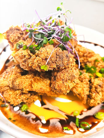 FRIED CHICKEN 22
Yogurt-marinated fried chicken, tamarind-honey yogurt sauce, mango compote, tamarind sauce.