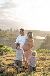 Family at sunset on a headland
