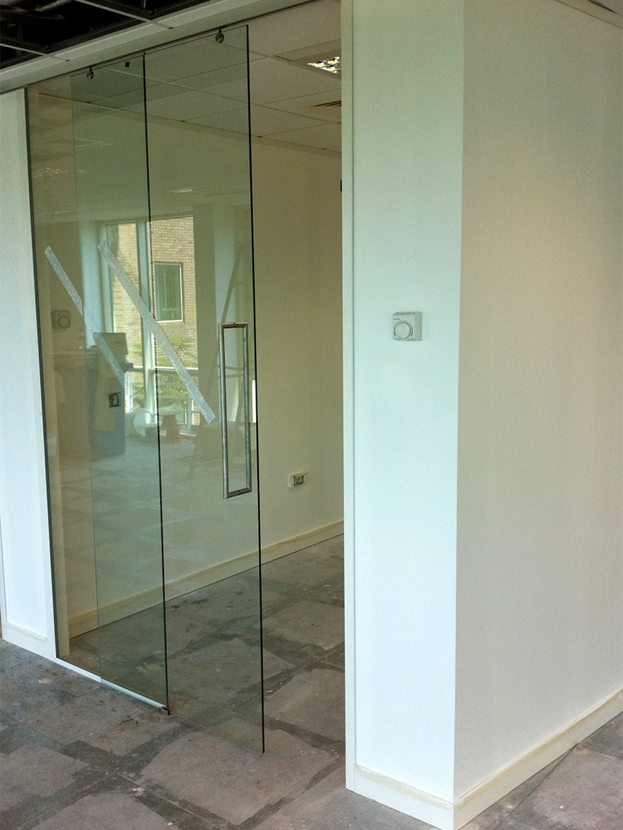 Top hung single glass sliding door