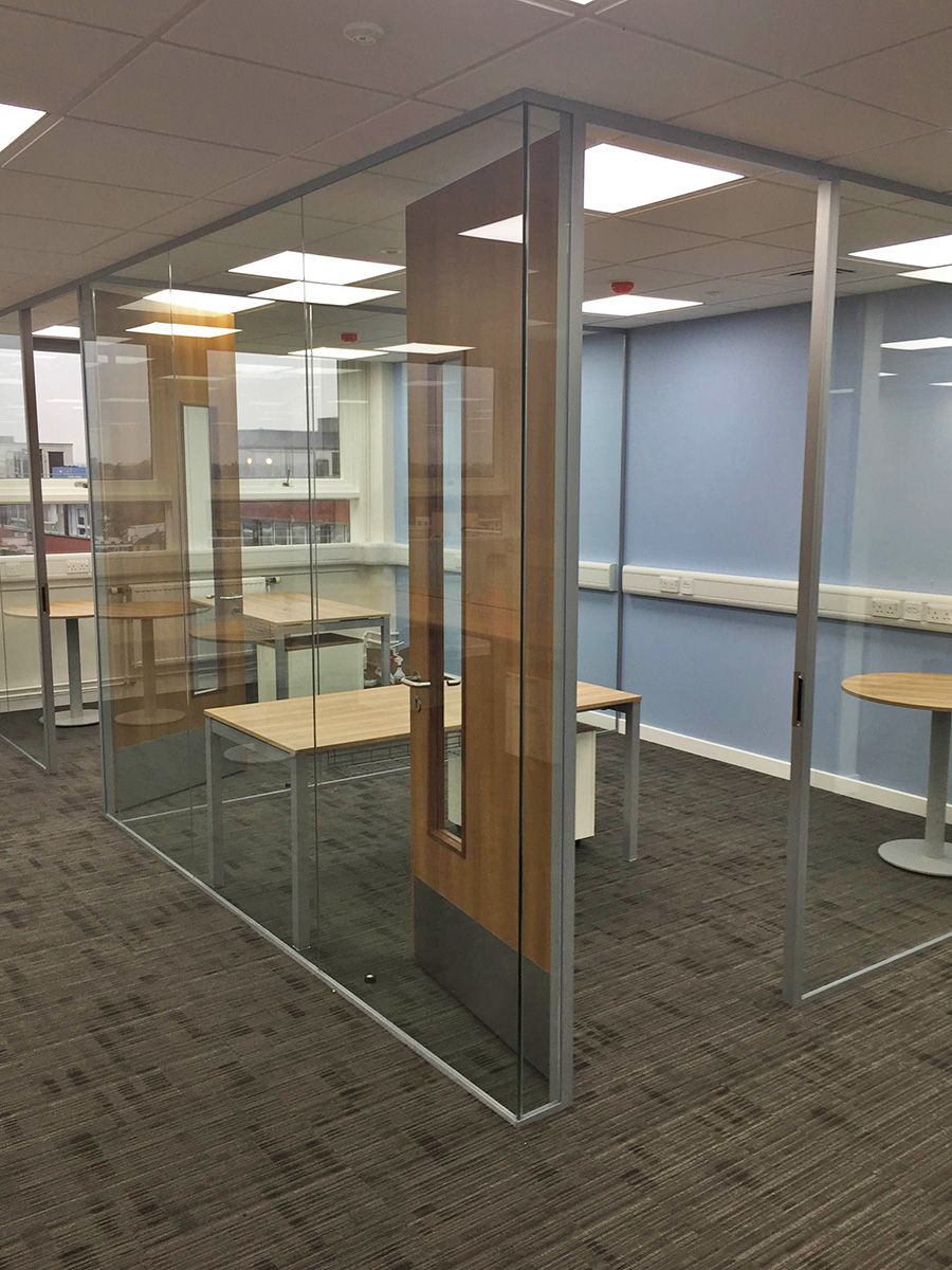 Frameless glass walls with timber doors