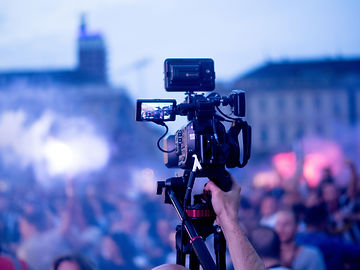 broadcasting-live-event-with-video-camera-4JVDW4M.jpeg