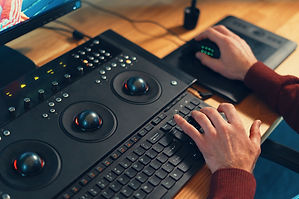 video-editor-hands-adjusting-color-or-sound-on-wor-FWKZDGX.jpeg