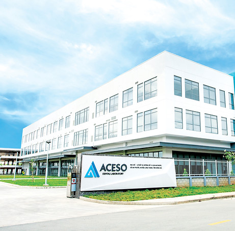 The modern, multi-story Aceso Dental Laboratory facility and headquarters, showcasing a state-of-the-art building for advanced dental restoration manufacturing.