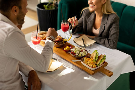 young-couple-having-lunch-and-drinking-fresh-squee-2025-02-21-22-09-19-utc.jpg