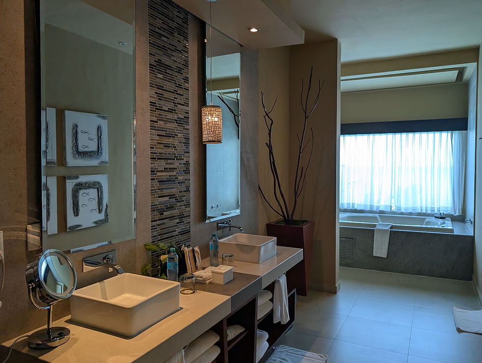 Generations Riviera Maya 1 Bedroom Suite bathroom with double sinks and jacuzzi