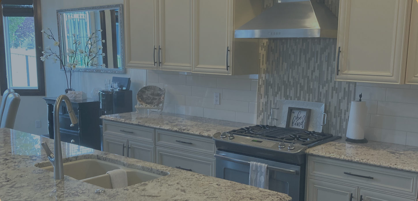 Sparkling Kitchen: A pristine kitchen with sparkling countertops, polished appliances, and a clean, clutter-free environment thanks to our house cleaning expertise
