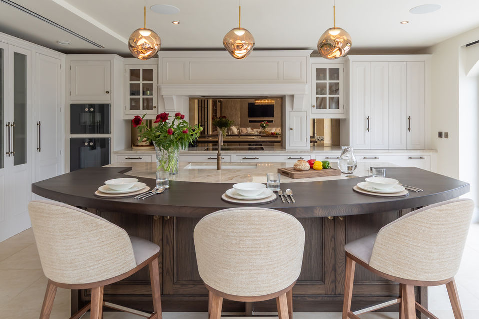 Spacious kitchen layout with large island set for dining and entertaining