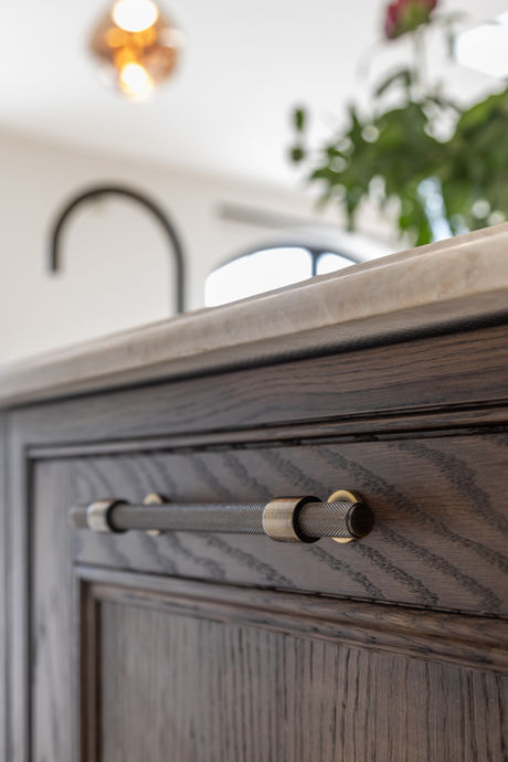 Close-up of timber island joinery and hardware detail
