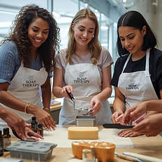 Small group collaborating during a Soap Therapy™ wellness experience focused on creativity and mindful engagement.