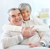 senior-couple-hugging-home (1).jpg