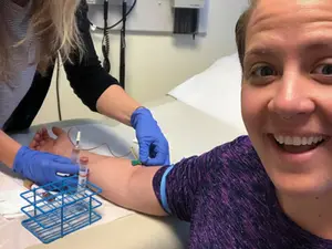Carolina Reid getting her blood drawn as part of a clinical trial for new experimental malaria vaccine based upon live malaria parasites.
Carolina Reid