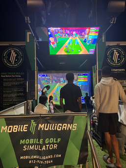 Mobile golf simulator truck parked in neighborhood during an 18th birthday party celebration