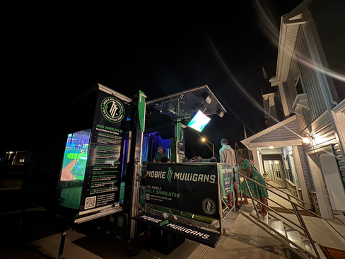 Friends entering the mobile golf simulator truck for interactive birthday party entertainment