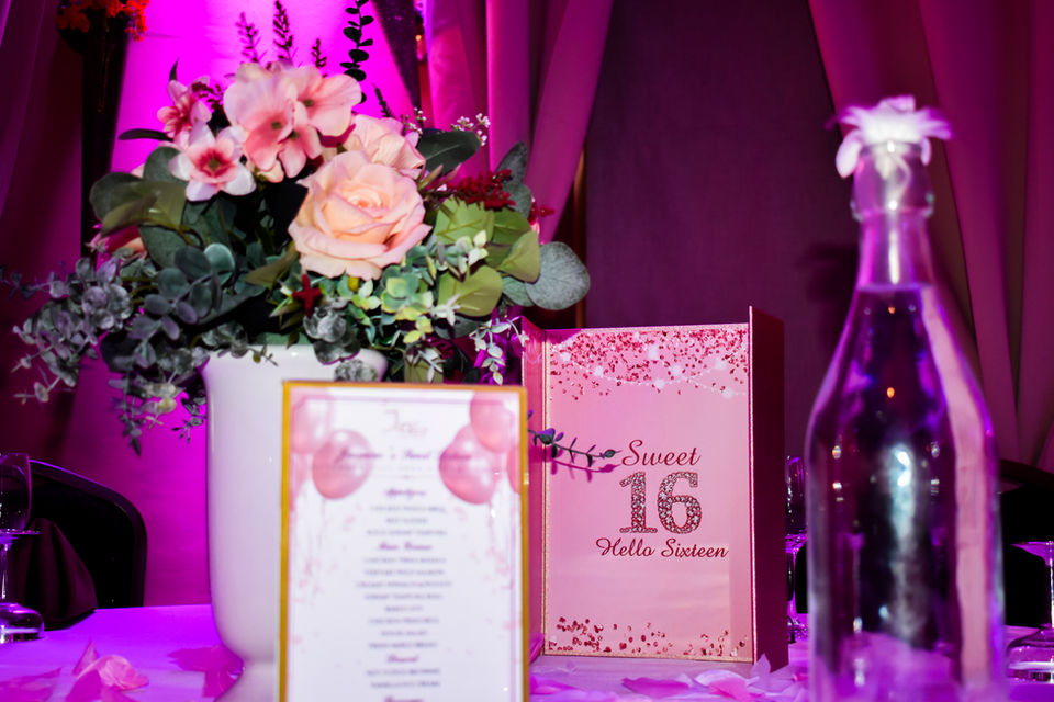 Floral centerpiece, custom-crafted menu, and private dining a private event venue in Forest Hills, NYC