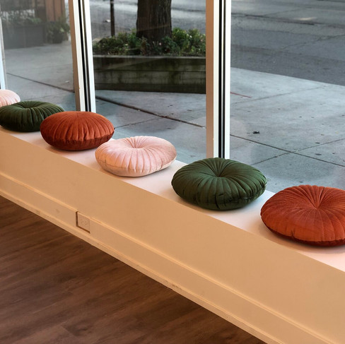 goldplaited lakeview salon pillows on bench by window