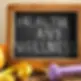 health and wellness written on a chalkboard
