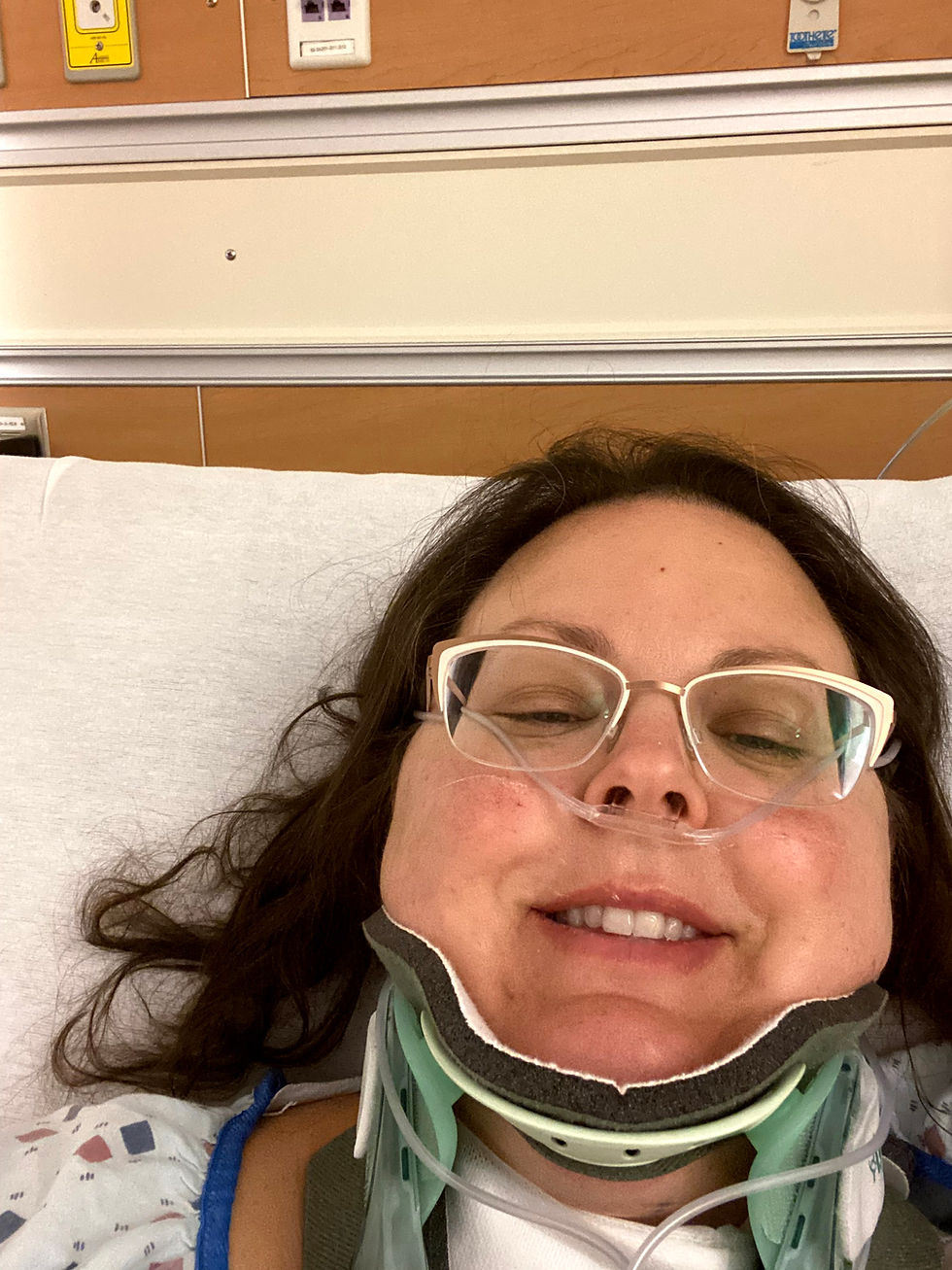 Recovering with a smile: Post spine surgery in May 2020.