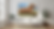Eye-level view of a cozy living room wall decorated with various art prints