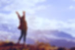 Hiker reaching the peak