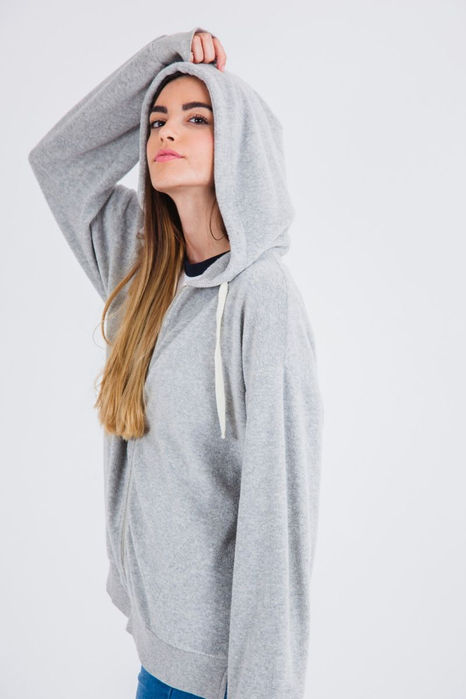 Trendy women's hoodie by Apparize, featuring modern designs and a flattering fit