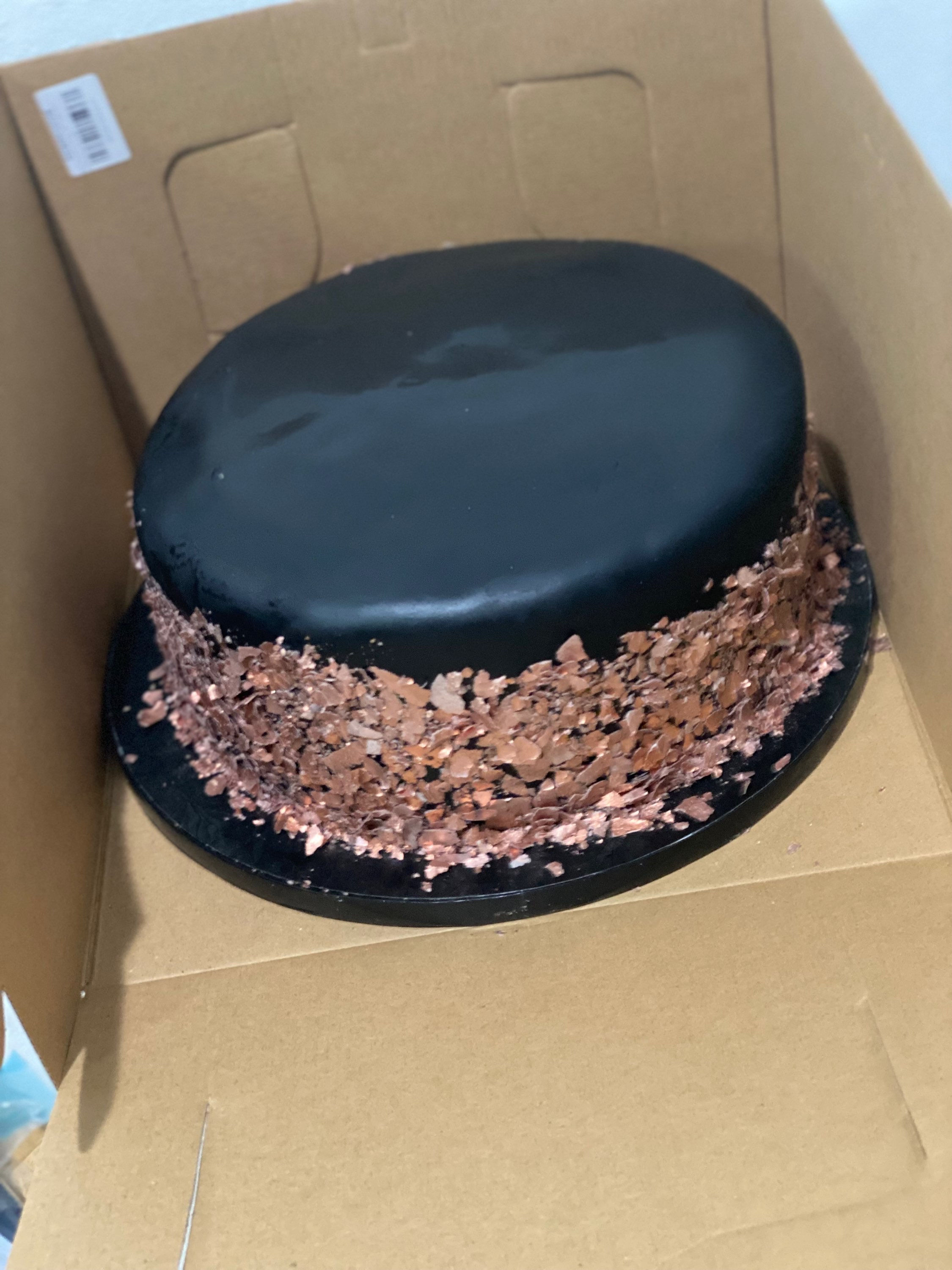 Rose gold and black cake