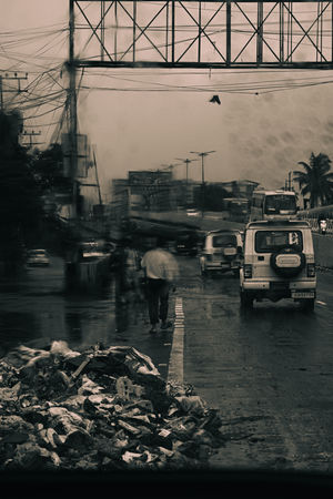 Rain Through A Rickshaw