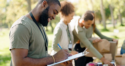 Happy people, volunteer and writing with clipboard for checklist on food, stock or supplie