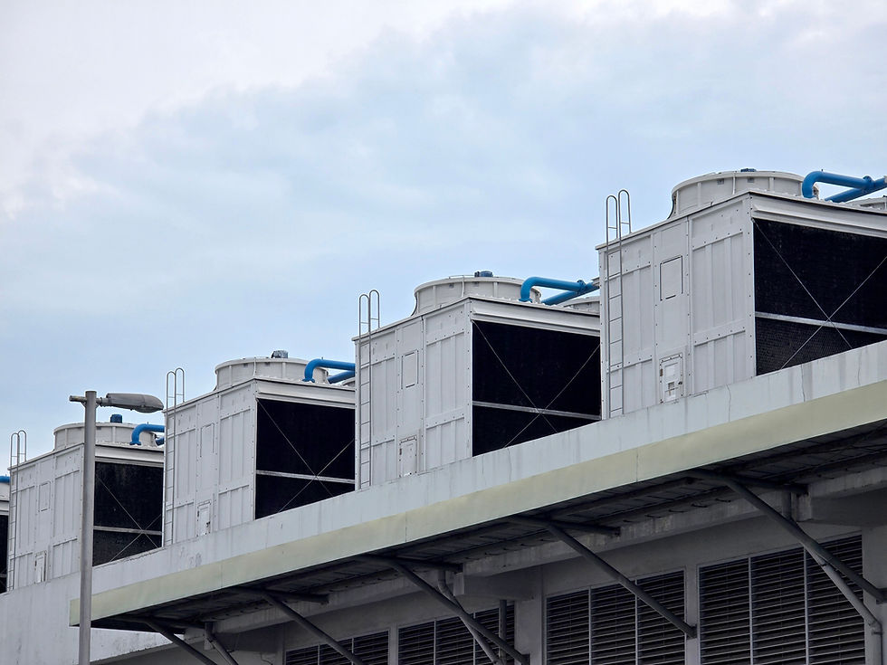 Cooling tower installation illustrating the typical application environment for Aevira's cyclone filtration system, emphasising the importance of side stream filtration in maintaining efficient and sustainable water treatment in HVAC cooling tower circuits.