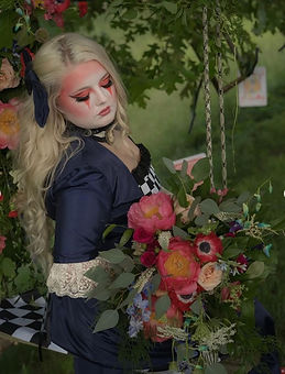 woman on swing with flowers 