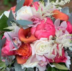 Pinks and oranges mix of peony and calla lily make for a beautiful bouquet