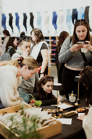 Personalized lululemon hair clip engraving station during a women's networking event in Boston