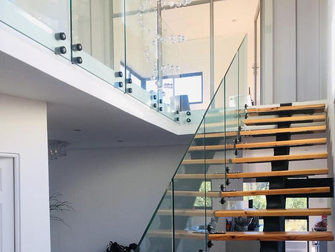Glass stand off Stairs wood second floor.jpeg