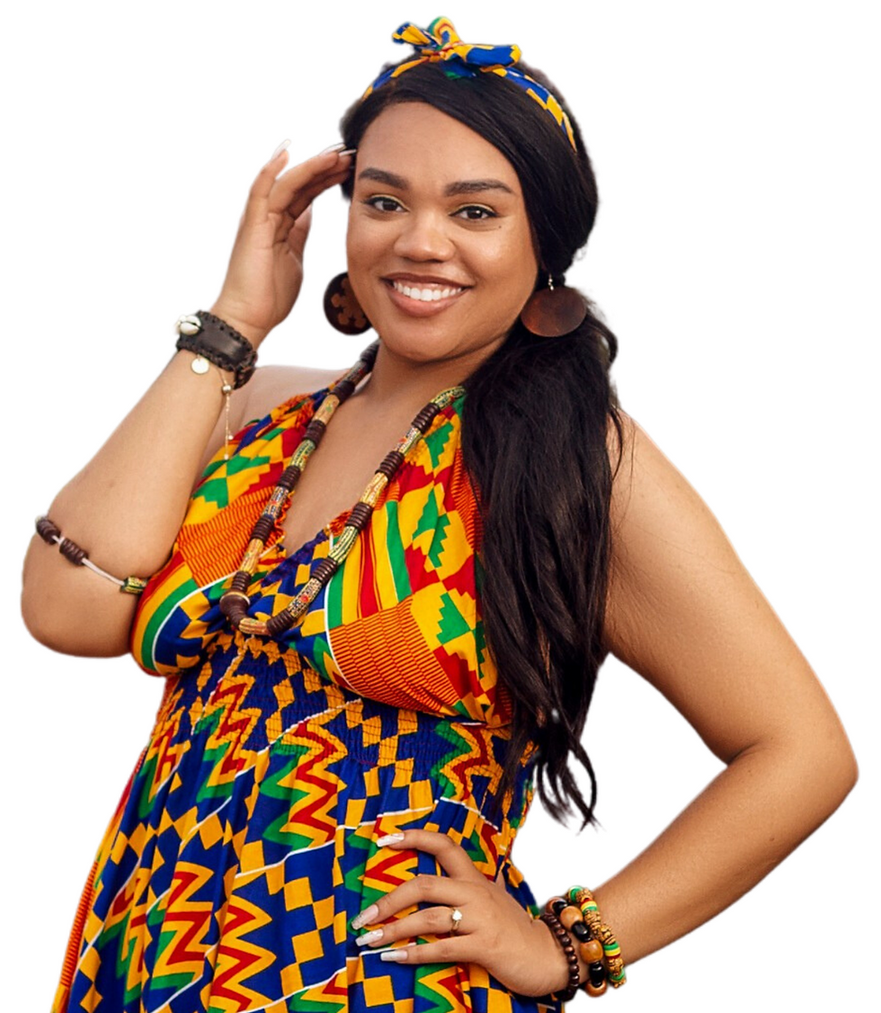 Smiling woman wearing colorful traditional African dress and head wrap