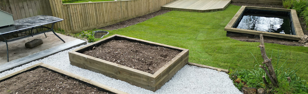 professionally landscaped garden in Cornwall, hand build decking, pond and raised sleeper beds