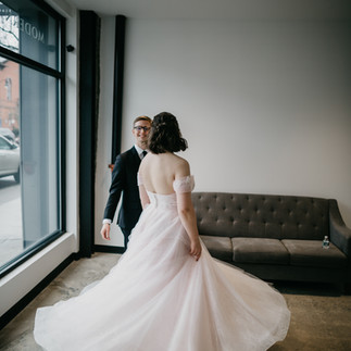 March wedding New England bride spinning in dress