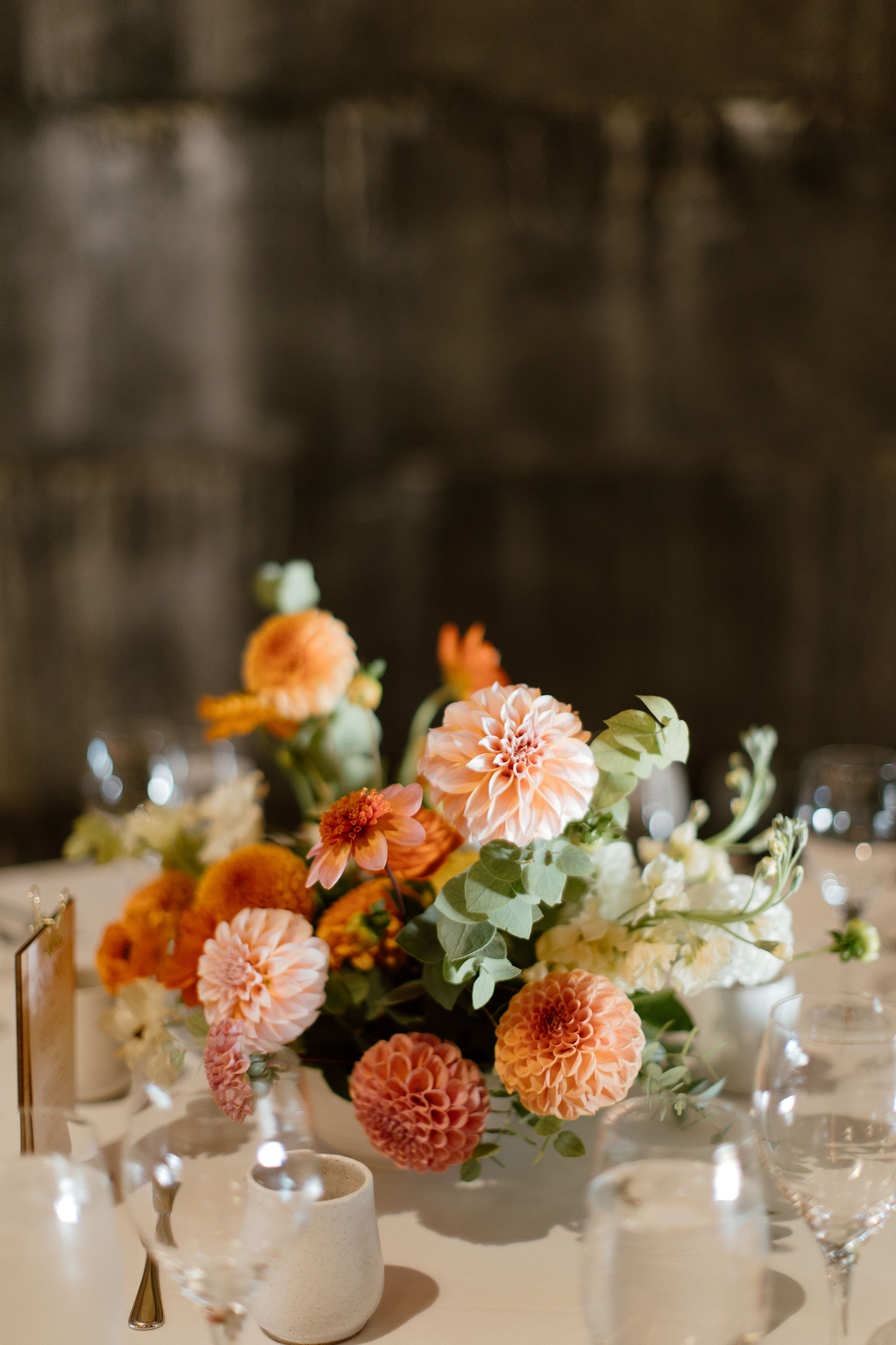Wedding centerpiece dahlia spring colors round table