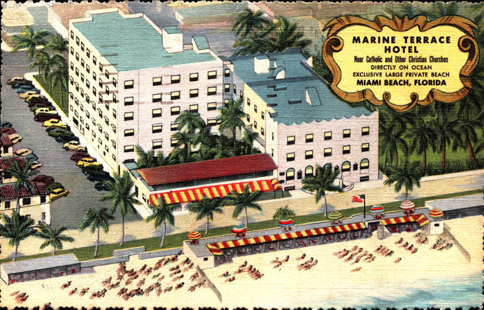 A vintage postcard depicting a beachside hotel and beachgoers