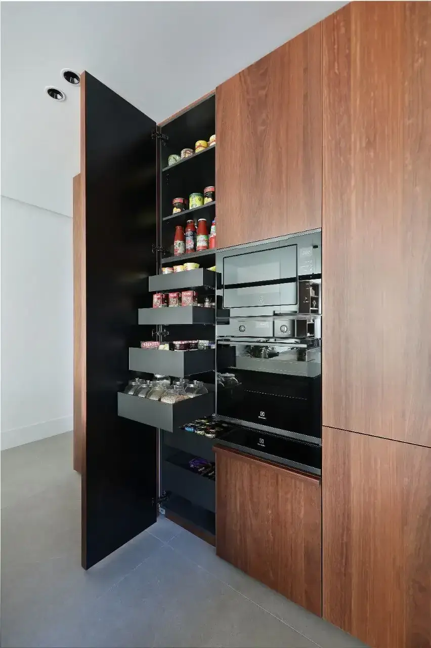 Custom pull-out pantry drawers in a Melbourne kitchen by PremierForm