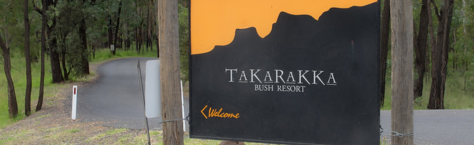 A sign beckons travellers to an accommodation centre at Carnarvon Gorge.
