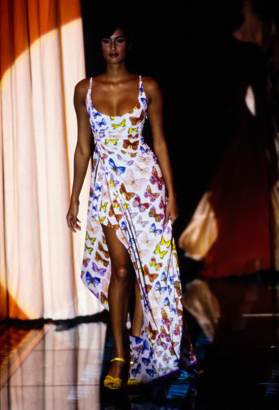 A number of pieces in the Versace Spring 1995 ready-to-wear show, including the maxi dress in this image, were made with this multi coloured butterfly print.