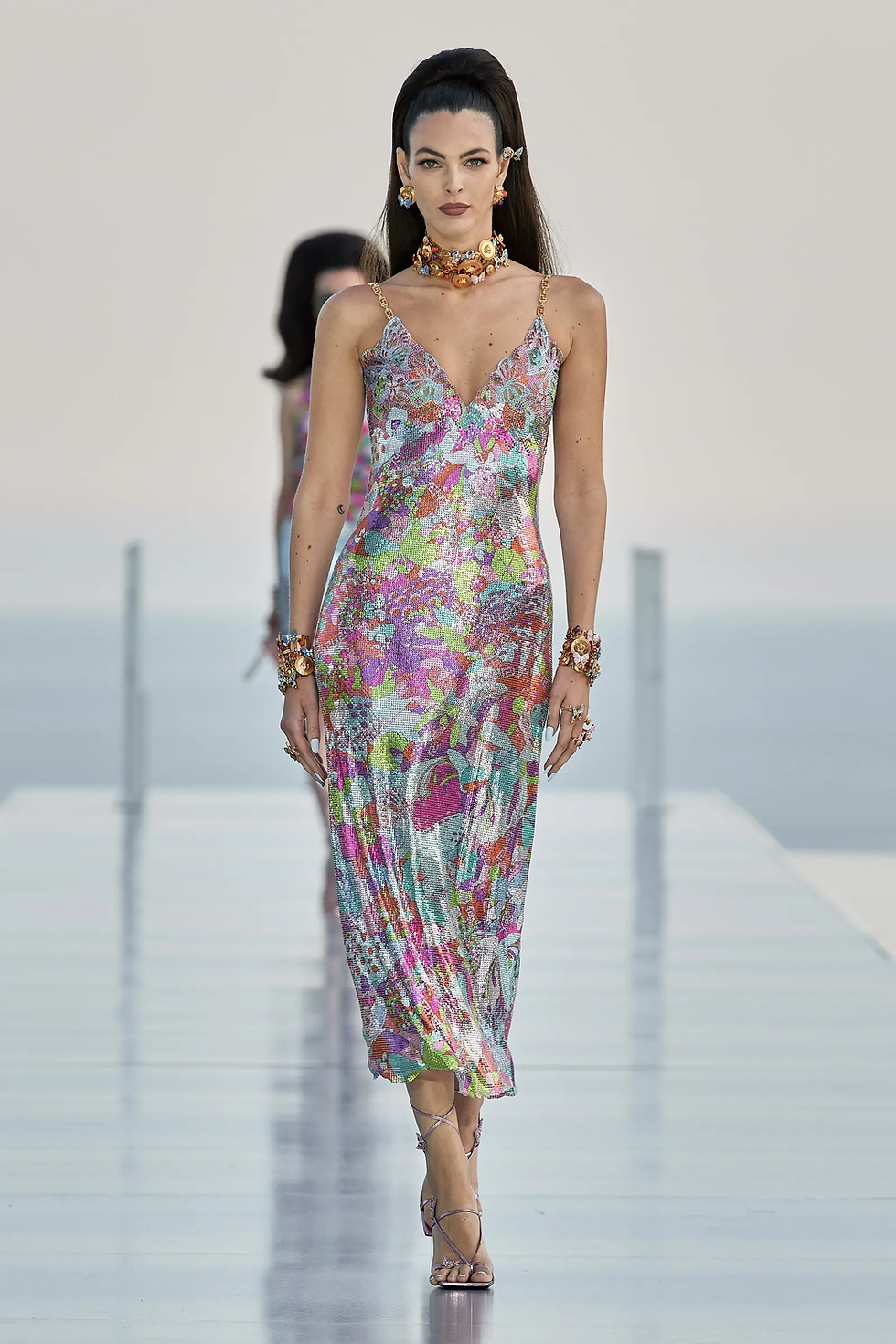 A multicoloured metallic La Vacanza Dua Lipa x Versace dress.